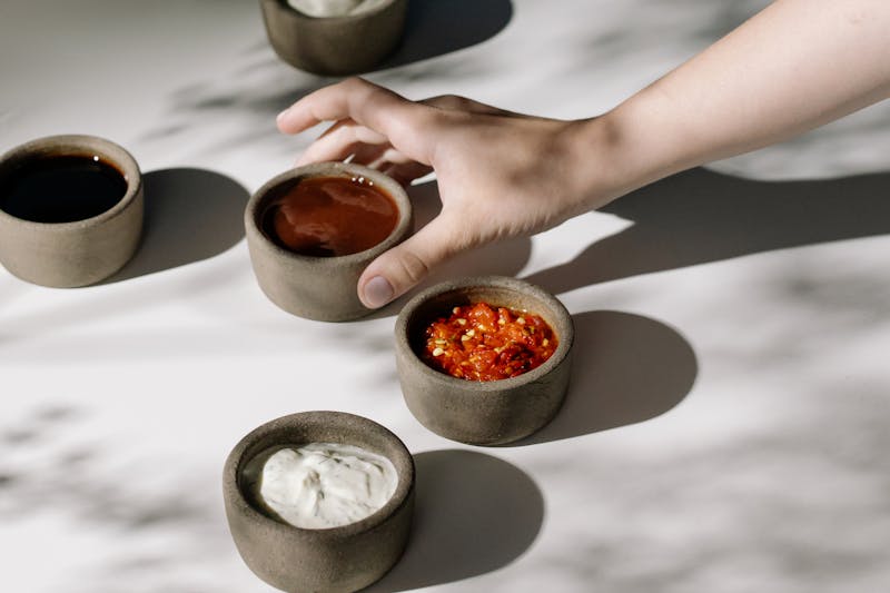 Selection of dipping sauces for mod pizza and sides